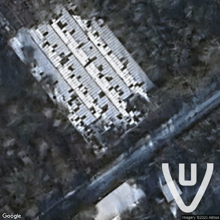 Ferme avec grandes serres