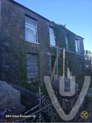 Two houses in one street