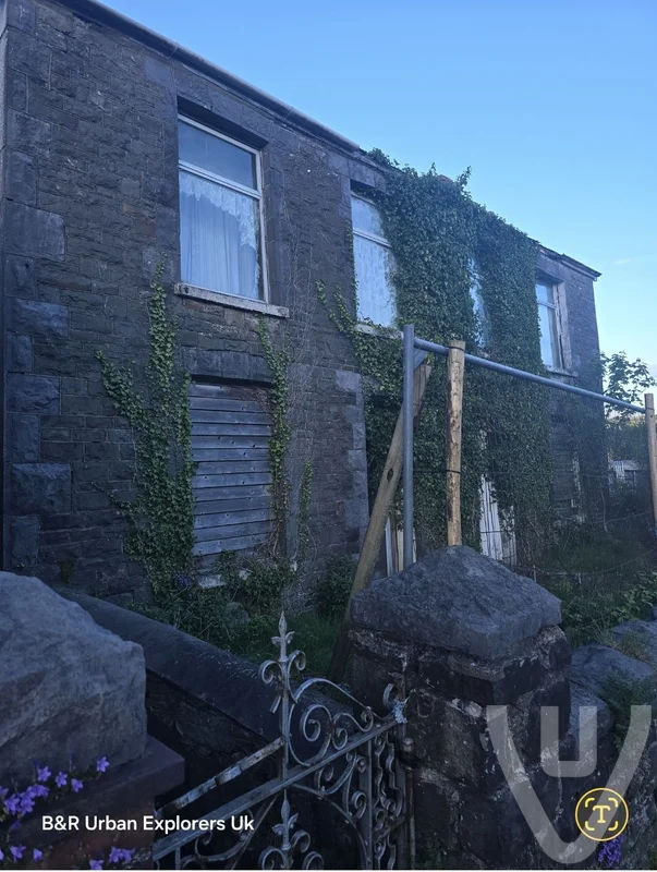 Two houses in one street