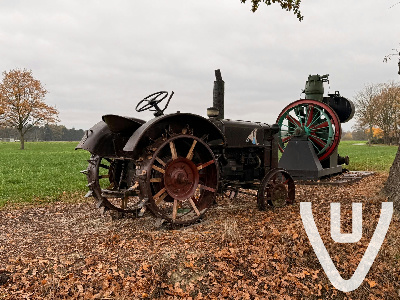 De Tractor In Het Veld